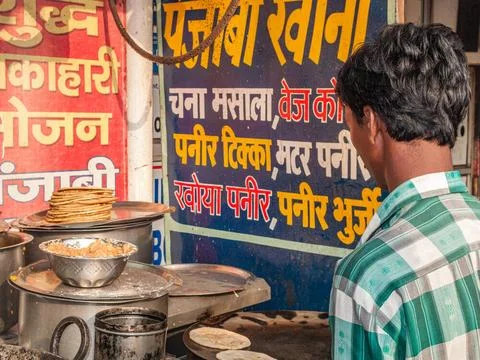 Paratha, the fried chapati bread, is a common breakfast for local people N... Stock Photos