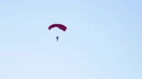 Paratrooper fly on the blue sky Stock Footage 54960340