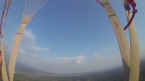 Paratrooper makes flight, first-person view Stock Footage 69117592