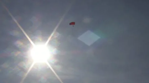 Paratrooper, Parachute in the Sun Stock Footage 12164844