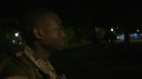 Paratrooper Running at Night Stock Footage 122835951