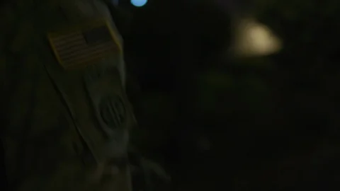Paratrooper Running at Night Stock Footage 122836455