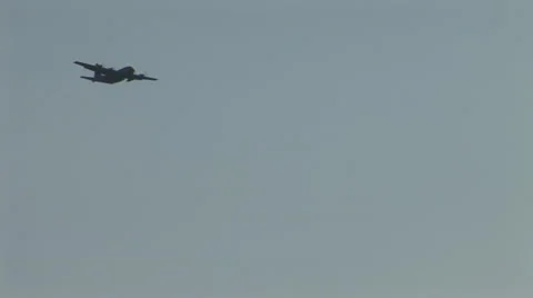 Paratroopers exiting plane (far) Stock Footage 36426070