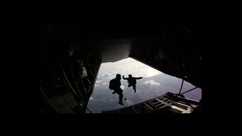 Paratroopers jump from a plane. Stock Footage 79417860