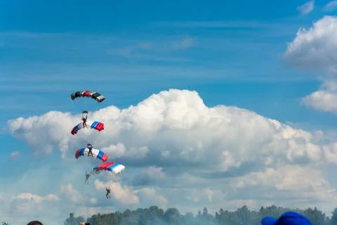 Paratroopers in the sky. Stock Photos