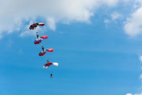 Paratroopers in the sky. Stock Photos