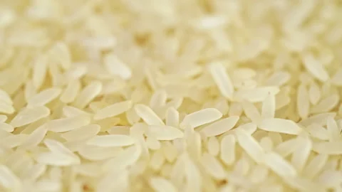 Parboiled rice texture. Top view, food background. Slow motion 스톡 동영상 243108663