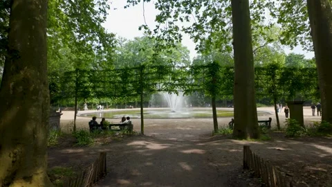 Parc de Bruxelles: A Stroll Towards the Fountain Stockbeeldmateriaal 276323869
