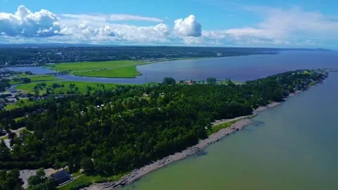 Parc de la Pointe &amp; its forest surrounding the mouth of the Rivière-du-Loup. Stockbeeldmateriaal 304300623