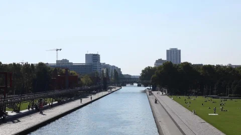 Parc de la villette in Paris with the Geode at Cite des Sciences. Big park with Stock Footage 110764803