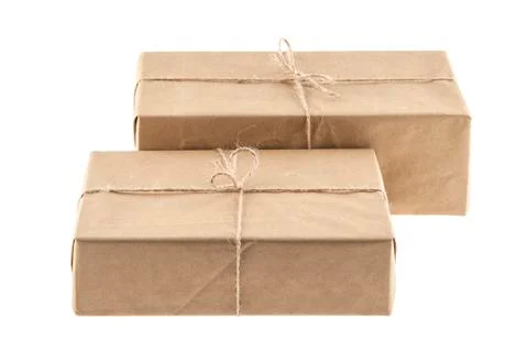 A parcel bounded with a rope isolated on a white background Stock Photos