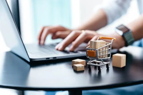 Parcel box in trolley on table. 库存照片