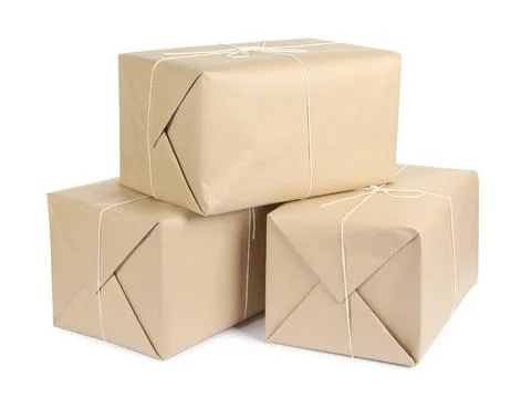 Parcel boxes wrapped in paper isolated on white Stock Photos
