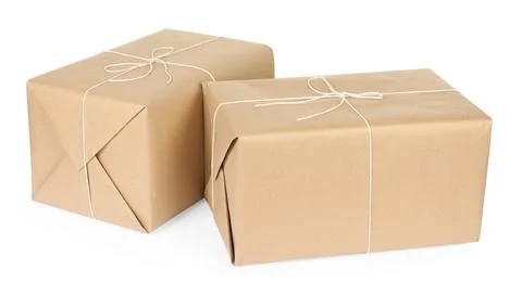 Parcel boxes wrapped in paper isolated on white Stock Photos