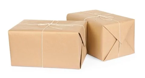Parcel boxes wrapped in paper isolated on white Stock Photos