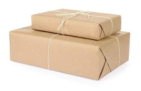 Parcel boxes wrapped in paper isolated on white Stock Photos