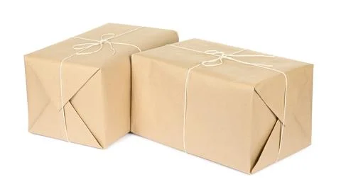 Parcel boxes wrapped in paper isolated on white Foto stock