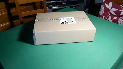 Parcel delivered at home on the table Vidéo 221561627