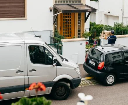 Parcel delivery in absence of the receiver Stock Photos