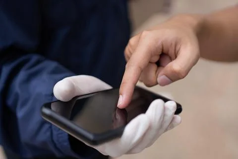 Parcel delivery concept the client pointing to confirm the ordered items at b Stock Photos