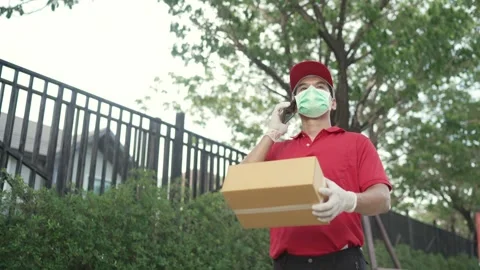 Parcel delivery worker Stock Footage 243070607