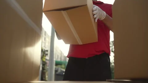 A parcel delivery worker Stock Footage 243070731