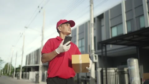 Parcel delivery worker Stock Footage 243070735