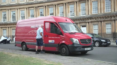 Parcel force delivery driver dropping off parcels and driving away 스톡 동영상 221172864