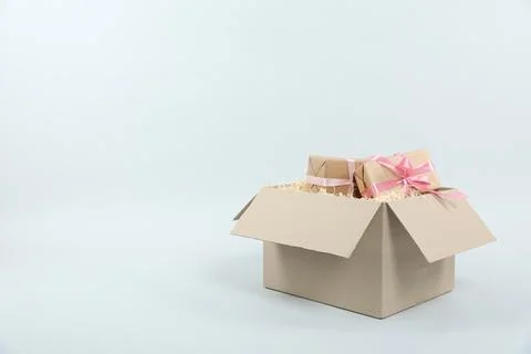 Parcel with gift boxes on light background 스톡 사진