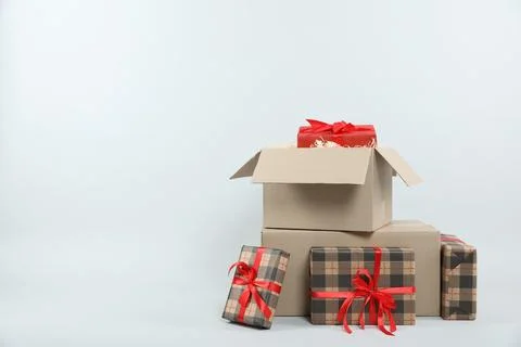 Parcel with gift boxes on light background 스톡 사진