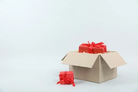 Parcel with gift boxes on light background Foto stock