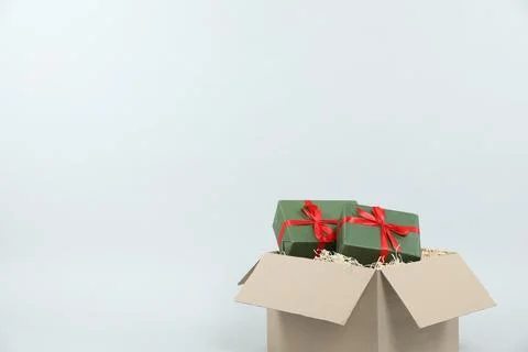 Parcel with gift boxes on light background 스톡 사진