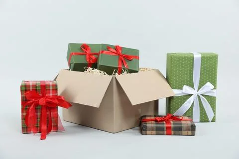 Parcel with gift boxes on light background 스톡 사진