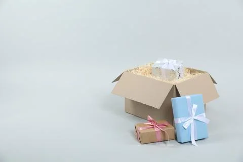Parcel with gift boxes on light background 스톡 사진