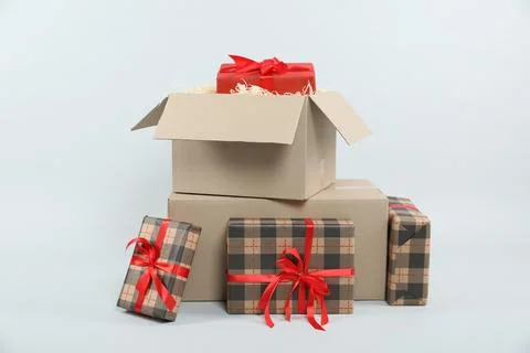 Parcel with gift boxes on light background 스톡 사진