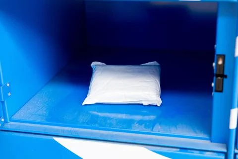 Parcel in locker of automated postal box. 写真素材