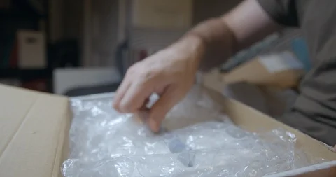 Parcel opening with tablet inside Video stock 100492003