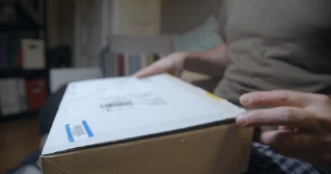 Parcel opening with tablet inside Stock Footage 100492011