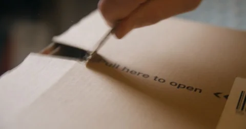 Parcel opening with tablet inside Stock-Footage 100492211