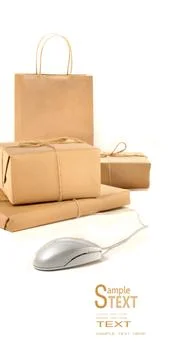 Parcel packages with computer mouse on white Stock Photos