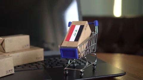 Parcel packaging box with a flag of Iraq in a shopping cart Video stock 102363561