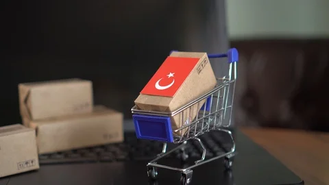 Parcel packaging box with a flag of Turkey in a shopping cart 스톡 동영상 102363544