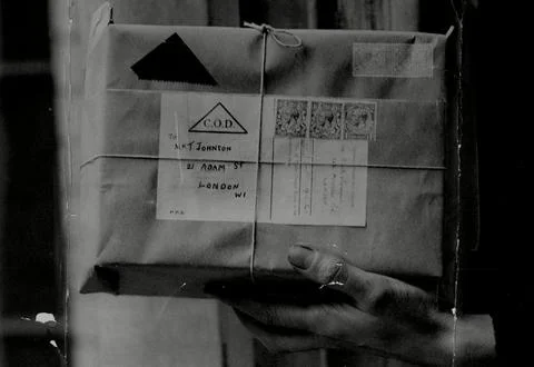 A Parcel Ready For Dispatch Under The New Cash On Delivery Postal System. Foto stock