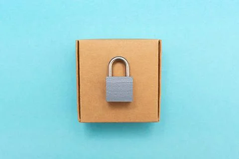 Parcel security. Lock on the box. Self-gathering cardboard. Delivery, moving Stock Photos