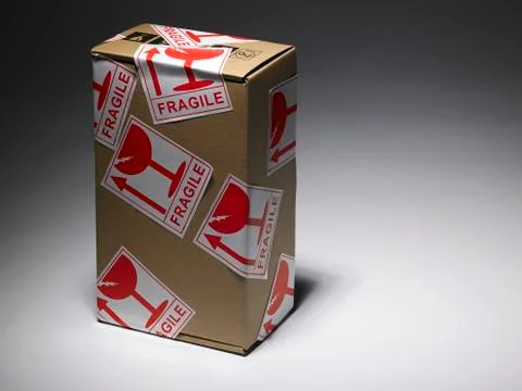 Parcel with sticker Stock Photos