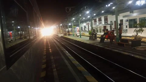 Parcel train stops at kroya station Stock Footage 239460278