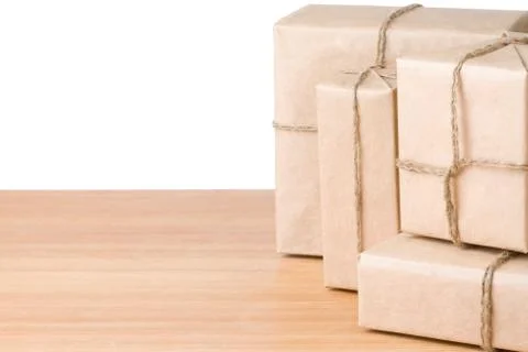 Parcel wrapped box isolated on white Stockfoto's