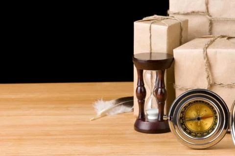 Parcel wrapped packaged box isolated on black Foto stock