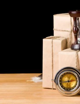 Parcel wrapped packaged box isolated on black Foto stock