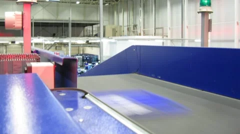 Parcels are carried on a conveyor for sorting. Time lapse. Stock Footage 58284782